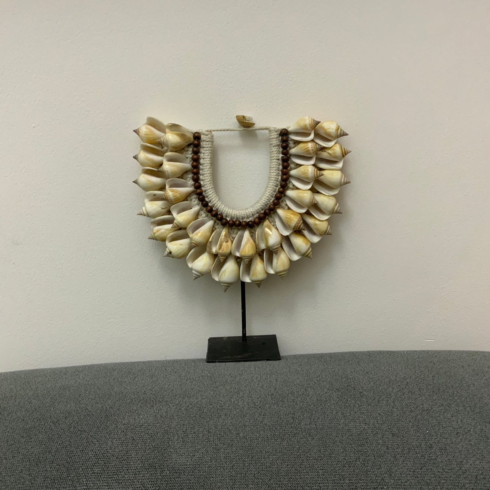 The Terra Conch & Wood Bead Statement Necklace on Stand